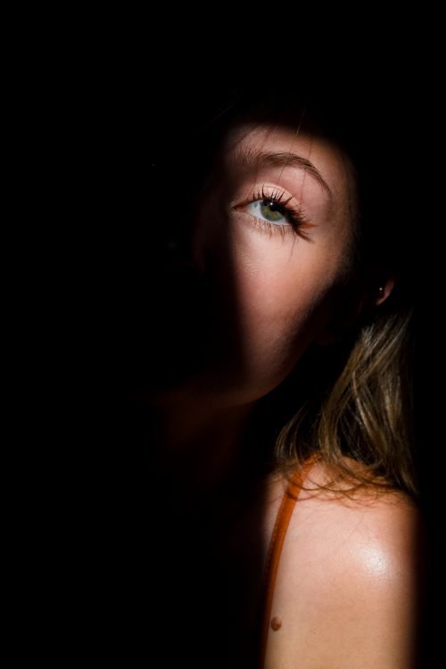 woman in half shadow