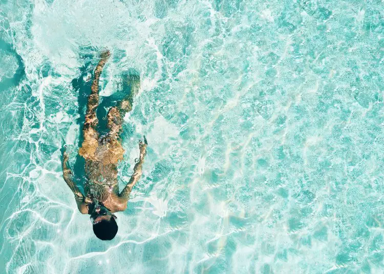 does self-tanner come off when you swim
