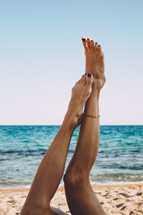Woman Lying on the beach